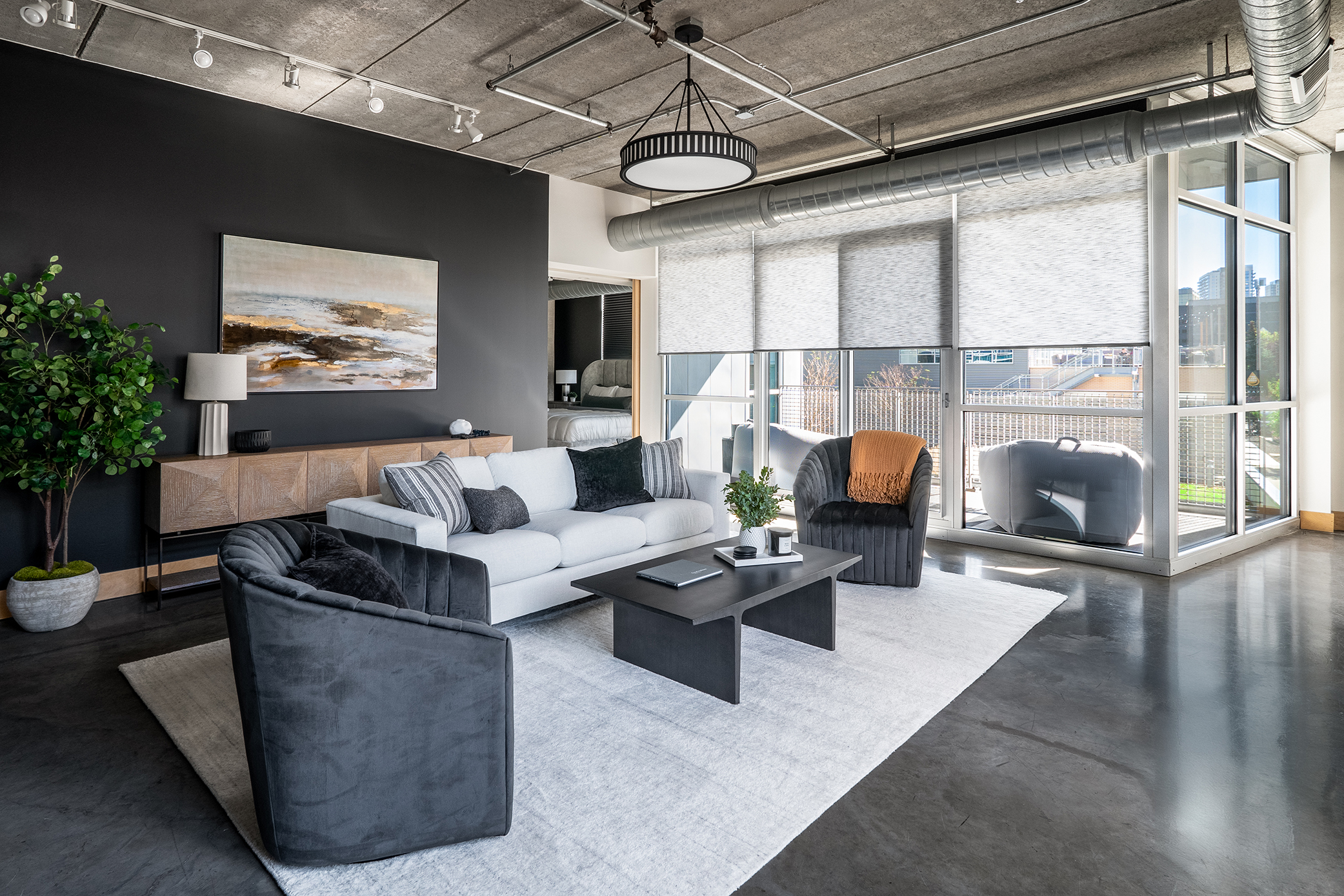 Modern industrial condo interior design living room in Lakeview.