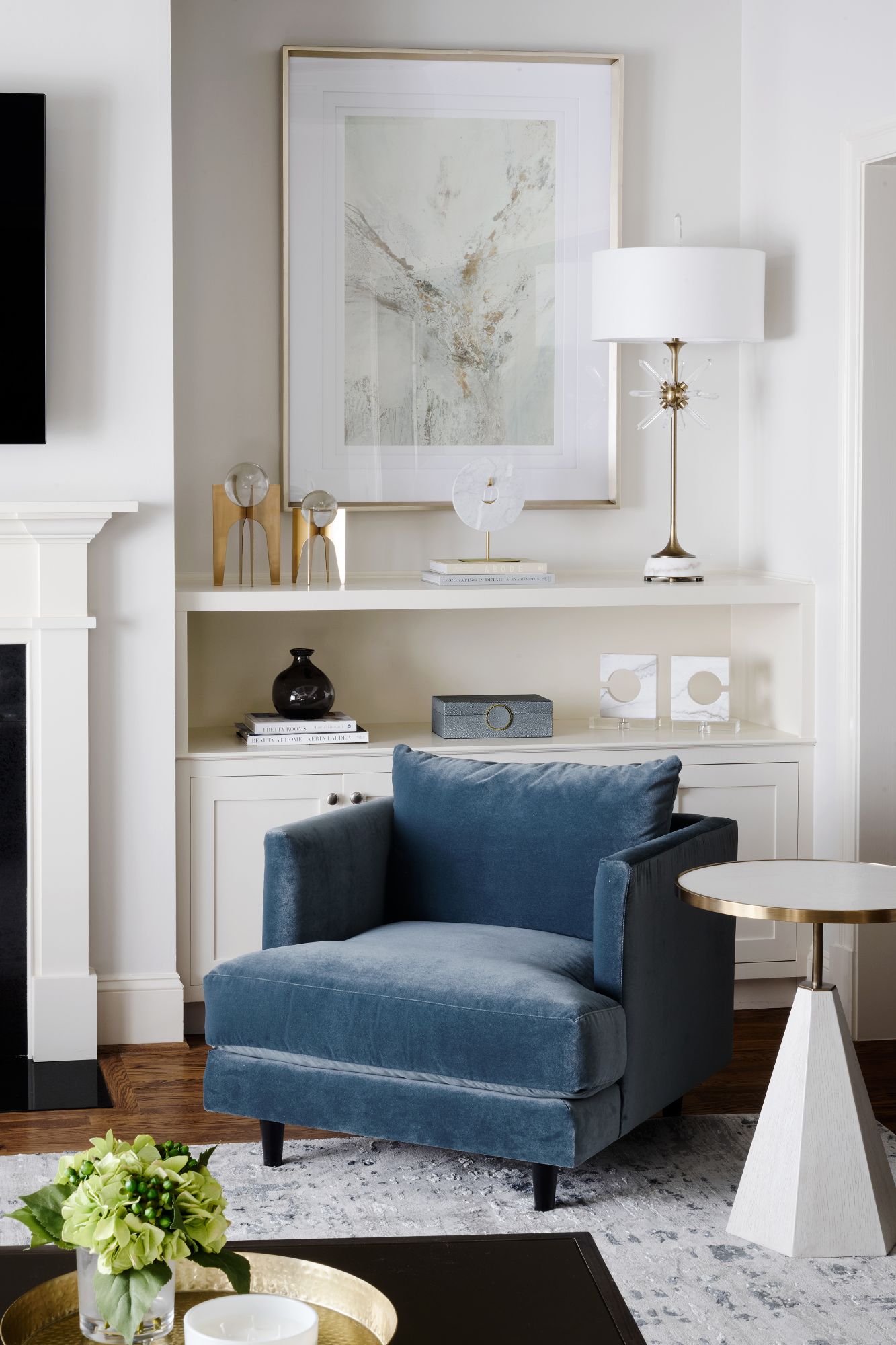 Accent chair in family room with accessories and interior decor in Winnetka.